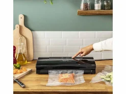 Hot Tefal Envasadora al vacío Vacupack Classic VT254070 negra con 18 bolsas, funciones automáticas de vacío y sellado, 110W Negro